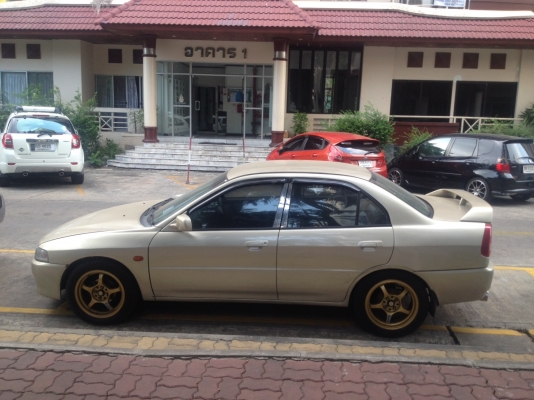 ขายMITSUBISHI LANCER ท้ายเบ๊น ปี 1997 สีทอง เกียร์ออโต้ ติดเเก๊ส LPGถังเเค็ปซูล ขายMITSUBISHI LANCER ท้ายเบ๊น ปี 1997 สีทอง เกียร์ออโต้ ติดเเก๊ส LPGถังเเค็ปซูล