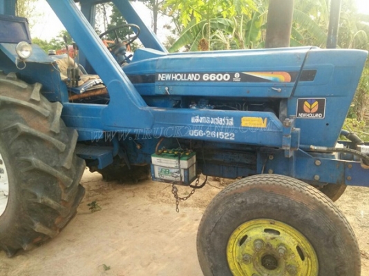รถไถ FORD NEWHOLLAND 6600 อุปกรณ์คีบแสงกลึง