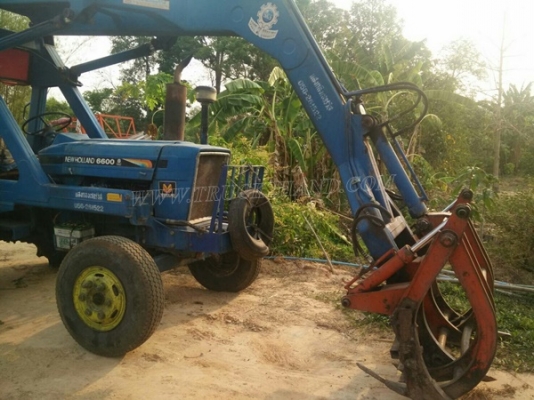 รถไถ FORD NEWHOLLAND 6600 อุปกรณ์คีบแสงกลึง