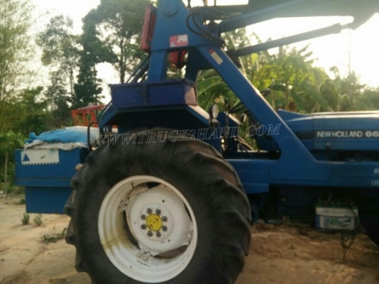 รถไถ FORD NEWHOLLAND 6600 อุปกรณ์คีบแสงกลึง