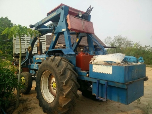 รถไถ FORD NEWHOLLAND 6600 อุปกรณ์คีบแสงกลึง