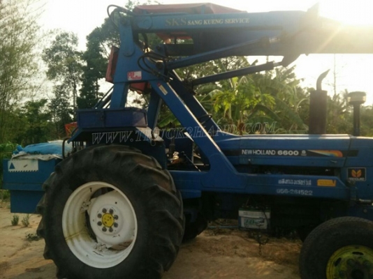 รถไถ FORD NEWHOLLAND 6600 อุปกรณ์คีบแสงกลึง