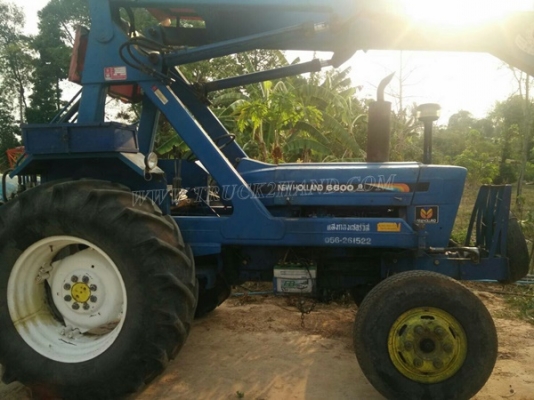 รถไถ FORD NEWHOLLAND 6600 อุปกรณ์คีบแสงกลึง