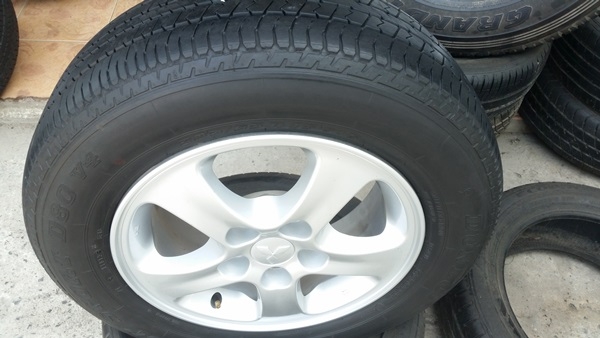 ขายล้อ Mitsubishi Triton 15ยาง205/65/15 ปี 13 4 ล้อ
