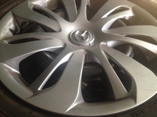 ขายล้อกะทะมาสด้า2พร้อมยางป้ายแดงปี 16