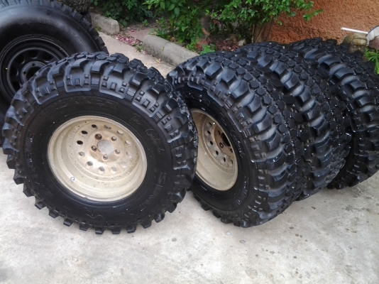 ขายยางตะขาบ 32 นิ้วพร้อมแมคหยดน้ำ ขอบ15" ยางเหลือเยอะไม่ค่อยได้ใช้ เส้นแดงยังอยู่เลย ขาย 18,500 บาท