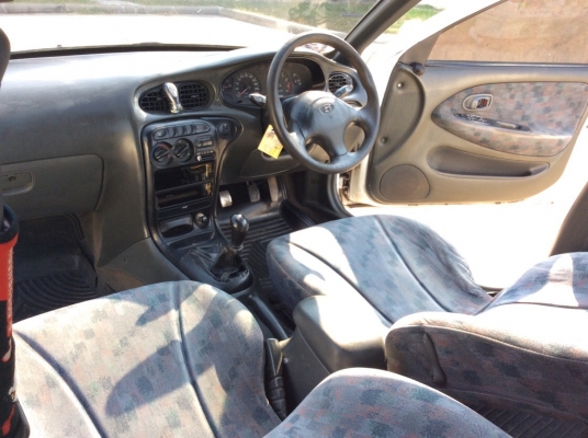 ขายรถ Hyundai New Elantra ไฟปิศาจ ปี96 เครื่องหัวฉีด 1.6 gls เกียร์ธรรมดา ติดแก๊สหัวฉีด เพาเวอร์ กระจกไฟฟ้าทั้งคัน ภายในเบาะเดิมๆสวยสะอาด แอร์หนาว ตัวถังเดิมๆไม่มีชนสีเงามีริ้วรอยนิดหน่อย ยางดี เครื่องแน่น รถขับดีพร้อมใช้เลยครับ ภาษีไม่ขาด ขายถูกครับ