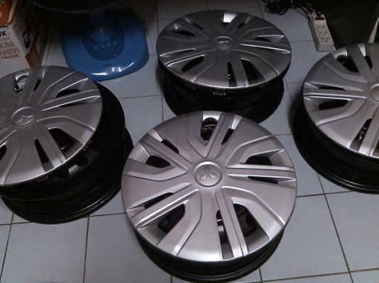 ขายล้อกะทะ new mirage พร้อมฝาครอบ กะทะขอบ14 4ล้อ800บาท