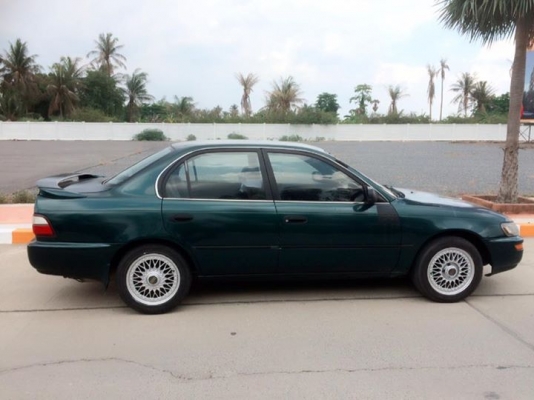 ฝากขาย โตโยต้า Corolla AE101(สามห่วง)สีเขียว รถปี93-94 ตัวท็อป ท้ายทับทิมแดง ฝากขาย โตโยต้า Corolla AE101(สามห่วง)สีเขียว รถปี93-94 ตัวท็อป ท้ายทับทิมแดง