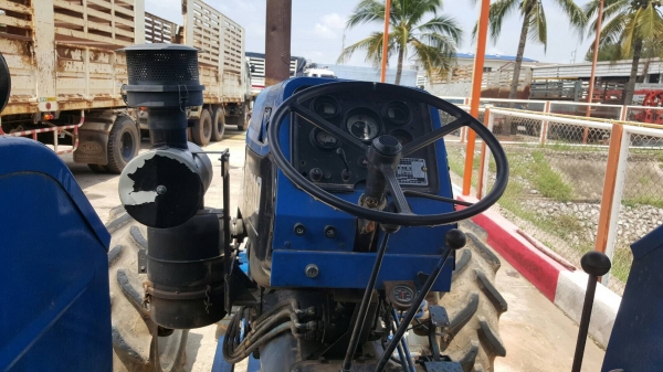 ขาย รถไถ 2 เพลา FORD NEW HOLLAND 6610 คานหน้า CARRARO ยางสวย อุปกรณ์มีผานดันหน้า และผาน 4 เอกสารเล่มทะเบียนครบ