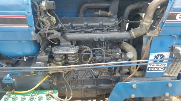 ขายรถไถ  FORD6610 2เพลา คานหน้าคาลาโล่ เครื่องเกียร์ปกติ ปั๊มปกติ อุปกปรณ์.ใบดันหน้า หาง7 มีเล่มทะเบียนครบ ราคา. 480,000 บาท ต่อรองได้ โทร.080-108-5007 บอล