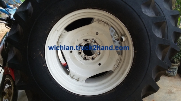 ขายแล้วครับ กะทะล้อหลังรถไถฟอร์ดเก่านอก กะทะขอบ 30"x15" พร้อมยางใหม่ไฟร์สโตน 18.4-30+ยางในใหม่