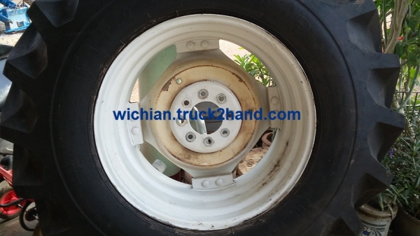 ขายแล้วครับ กะทะล้อหลังรถไถฟอร์ดเก่านอก กะทะขอบ 30"x15" พร้อมยางใหม่ไฟร์สโตน 18.4-30+ยางในใหม่