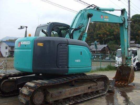Kobelco SK135SR-1ES (YY04) มีใบมีดดัน แทรคเหล็กหุ้มก้อนยาง นำเข้าเองจากญี่ปุ่นโดยตรง