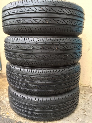 ขายยาง FIRESTONE TZ700 185-65-14 ปี12 สภาพป้ายแดง ตุ่มหน้ายางยังอยู่ ชุดละ 2,900 บาท