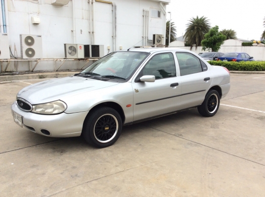 ขายรถฟอร์ด มอนดิโอ ปี98 เครื่องโตโยต้า 3Sหัวฉีด เกียร์ออโต้ ติดแก๊สLPG เพาเวอร์ ไฟฟ้า airbag2ใบ เบรคABS ภายในเดิมสวยๆเบาะหนังสวยสะอาด แอร์วิทยุCD ต้วถังเดิมตะเข็บเดิมทั้งคันไม่มีชน สีเงาสวยบางเดิม แม็กBBS รถขับดีเลยครับ พร้อมใช้ได้เลย ขายถูกครับ